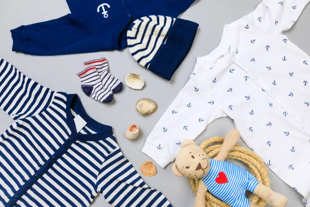 bably clothes and teddy, top down view