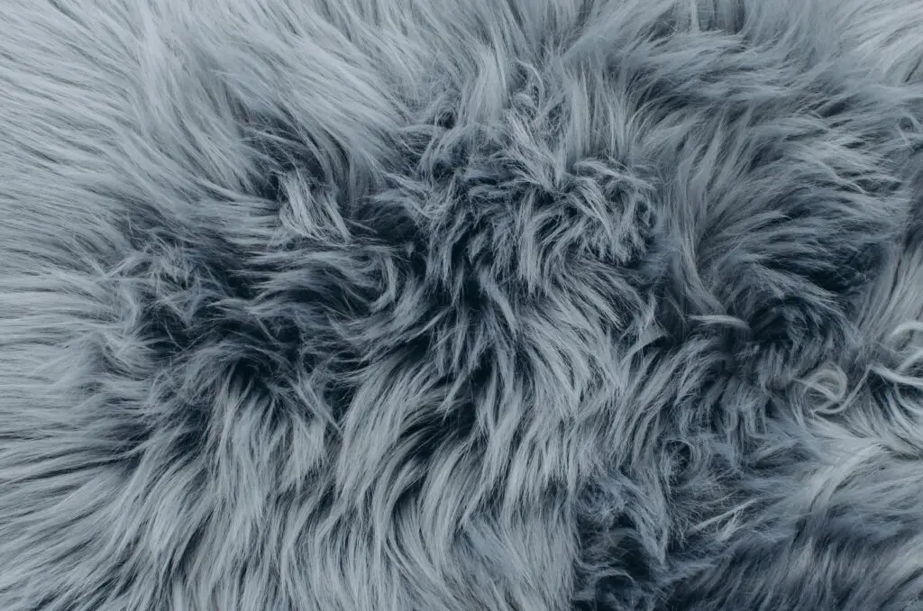 Grey or blue furry fabric. Furry fabric can be difficult to sew.